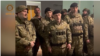 Ханбиев Мохьмад (йуккъерниг) ву эскархошца оккупаци йинчу Украинан дозанаш тIехь. 2024-чу шеран охан-беттан 23-чохь Кадыров Рамзанан телеграм-канале йаьккхинчу видео йукъара йина скриншот