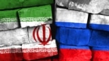 Concept of the relationship between Iran and Russia with two painted flags on a damaged brick wall