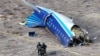 Фрагмент рухнувшего самолета Azerbaijan Airlines в Мангистауской области Казахстана