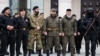 Соьлжа-ГIаларчу майданахь нохчийн эскарш дIахIиттийначу заманчохь Кадыров Рамзан, Чиллан-беттан 26-гIа де, 2022 шо
Рамзан Кадыров во время построения чеченских войск на площади в Грозном, 26 февраля 2022 года