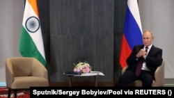 Владимир Путин перед встречей с Нарендрой Моди на полях саммита ШОС в Самарканде. 16 сентября 2022 года