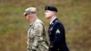 U.S. Army Sergeant Bowe Bergdahl, right, is escorted as he arrives at the courthouse for the start of sentencing proceedings in his court martial at Fort Bragg, North Carolina, U.S., on October 23.