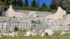 Bosnia and Herzegovina, Mostar, Gathering of citizens at the devastated Partisan Memorial Cemetery, June 16, 2022