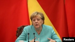 Nemačka vlada će se angažovati do poslednjeg dana: Angela Merkel
