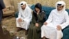 Faye Hall speaks on the phone at the Qatari Embassy in Kabul following her release.