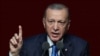 Turkish President Recep Tayyip Erdogan delivers a speech during the 2023-2024 Academic Year Opening Ceremony at the Bestepe People's Congress and Culture Centre in Ankara on October 9, 2023. (Photo by Adem ALTAN / AFP)