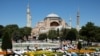TURKEY -- Muslims attend Friday prayers outside Hagia Sophia Grand Mosque