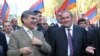 Armenia - Opposition leaders Levon Ter-Petrosian (R) and Aram Sarkisian lead a demonstration in Yerevan.