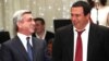 Armenia - President Serzh Sarkisian (L) and Prosperous Armenia Party leader Gagik Tsarukian attend an official celebration in Yerevan.