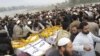 Supporters of militants group Al-Badar, which has ties with Afghan militant group Haqqani network, in 2015
