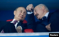 Володимир Путін і Олександр Лукашенко на церемонії закриття Європейських ігор у червні
