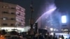 Authorities used water canon in Tehran to disperse demonstrators.