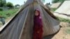 FILE: Hundreds of thousands of vulnerable Pakistanis depend on aid groups for essential services.
