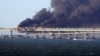 Последствия удара украинских военных по Керченскому мосту в октябре 2022 года, архивное фото 