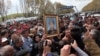 Armenia - Relatives of Lyuks Stepanian, a soldier killed by a fellow conscript on May 15, demonstrate on a highway 50 kilometers north of Yerevan, 18May2013.