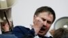 UKRAINE -- Former Georgian president Mikheil Saakashvili reacts after he was freed by his supporters in Kyiv, December 5, 2017