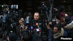 Armenia - Vigen Sargsian, the Republican Party's top election candidate, speaks to reporetrs outside a polling station in Yerevan, December 9, 2018.