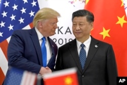 Президент США Дональд Трамп и председатель КНР Си Цзиньпин (архивное фото)