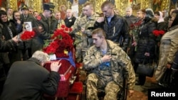 Похороны украинского военнослужащего Игоря Брановицкого, убитого на востоке Украины. Киев, 3 апреля 2015 года.