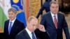 Раҳмон ва Отамбоев( дар байн - Путин)