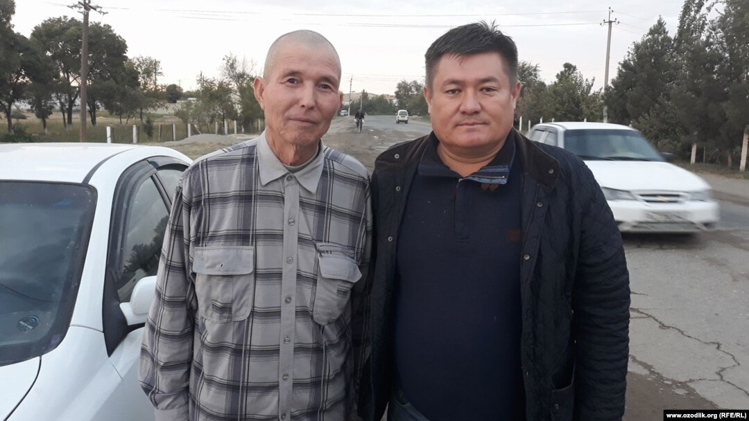 Uzbek journalist Salijon Abdurahmonov (left) with human rights activist Abdurahmon Tashanov upon his release from prison on October 4. 