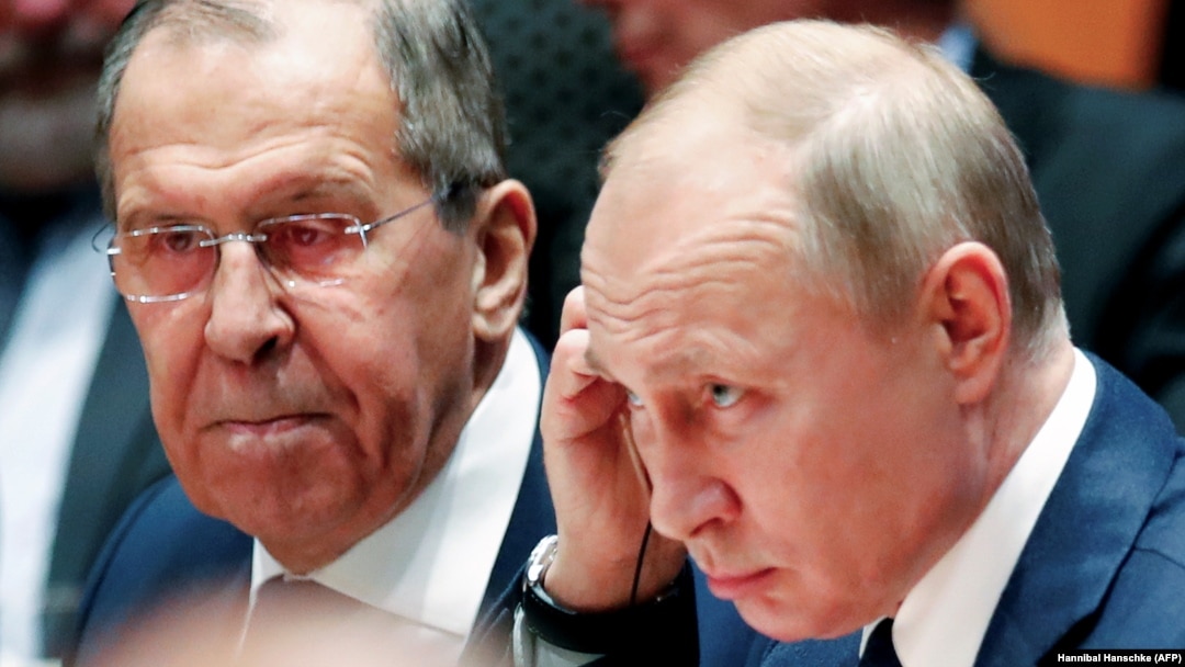 Руският външен министър Сергей Лавров и президентът Владимир Путин по време на конференцията за Либия в Берлин през 2019 г.