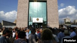 Armenia -- People near the court in Yeravan where opposition activists were sentenced to jail. 20July, 2012