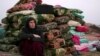 Бесарпаноҳмондагон дар Сурия дар наздикии шаҳри Манбиҷ