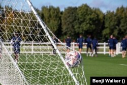 Wycombe Wanderers ойыншыларының жаттығуы.
