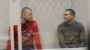 Екс-беркутівці Сергій Зінченко та Павло Аброськін під час судового засідання у Печерському суді. Київ, 23 січня 2015 року