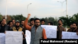 کراچۍ کې د پي ټي اېم د مظاهرې پخوانی تصویر.
