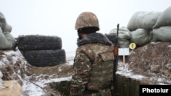 Armenia - An Armenian soldier on combat duty on the border with Azerbaijan, 30Dec2015.