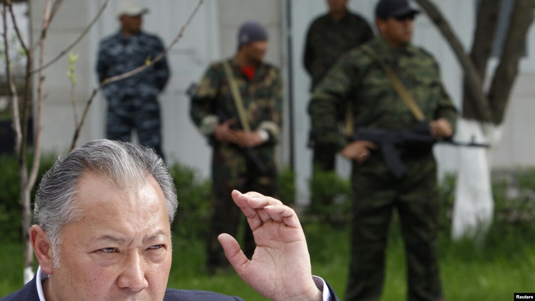 Ousted Kyrgyz President Kurmanbek Bakiev speaks to reporters in Teyit on April 13.