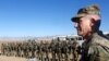 U.S. Army General John Nicholson speaks with Afghan police special forces after they took part in a military exercise in November.