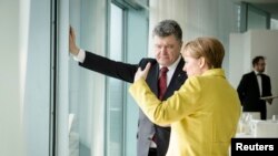 Президент України Петро Порошенко та канцлер Німеччини Анґела Меркель. Берлін, березень 2015 року
