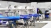 Sweden - A member of military personnel works to prepare a field hospital which will provide extra intensive care space for patients with coronavirus disease (COVID-19), 