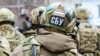 За кожне виконане завдання нацгвардієць і його спільник отримували від свого «куратора» з ФСБ від 100 до 1000 доларів (фото ілюстративне)