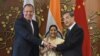 Russian Foreign Minister Sergey Lavrov (L), Indian External Affairs Minister Sushma Swaraj (C), and Chinese Foreign Minister Wang Yi pose for a photograph ahead of a trilateral meeting in New Delhi on December 11. 