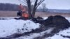 Экскаватор на берегу Казанки в охранной зоне "Русско-Немецкой Швейцарии", 5 января 2025 года. 