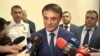 Armenia -- Valeri Osipian, the Armenian police chief, speaks to journalists. 