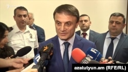 Armenia -- Valeri Osipian, the Armenian police chief, speaks to journalists. 
